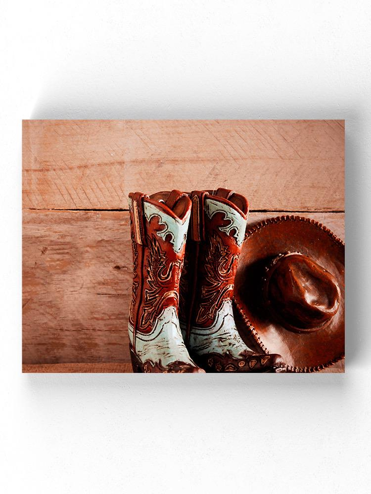 Cowboy Boots And Hat Wrapped Canvas -Image by Shutterstock