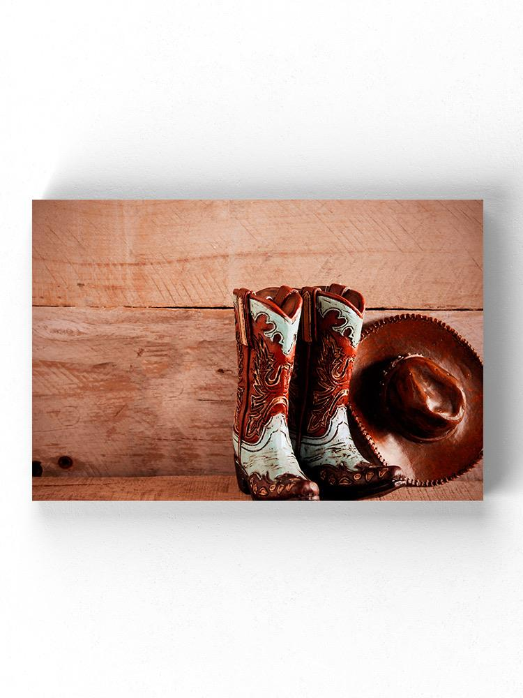 Cowboy Boots And Hat Wrapped Canvas -Image by Shutterstock